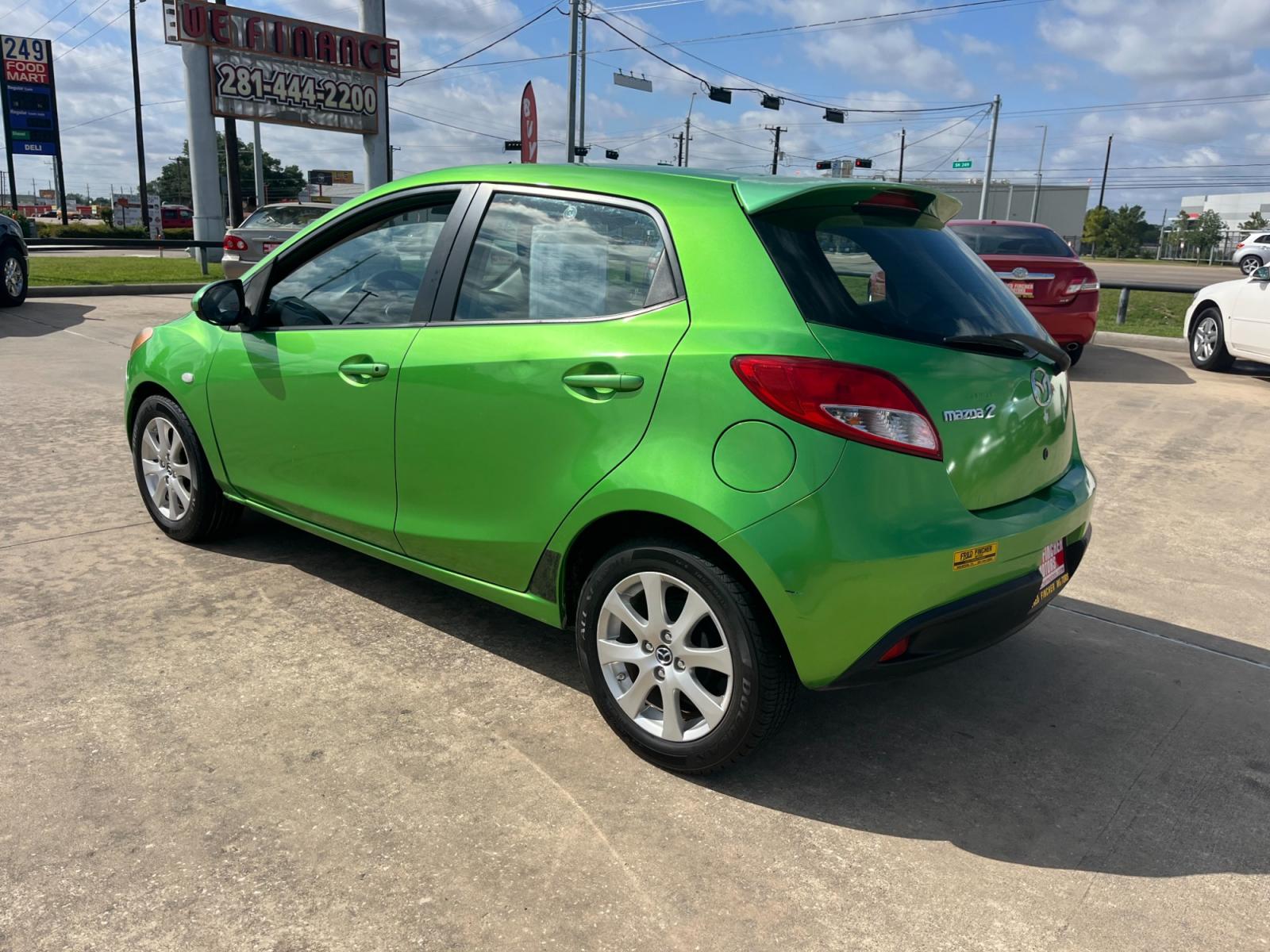 2013 green /black Mazda MAZDA2 Touring (JM1DE1LY1D0) with an 1.5L L4 DOHC 16V engine, Automatic transmission, located at 14700 Tomball Parkway 249, Houston, TX, 77086, (281) 444-2200, 29.928619, -95.504074 - Photo #4